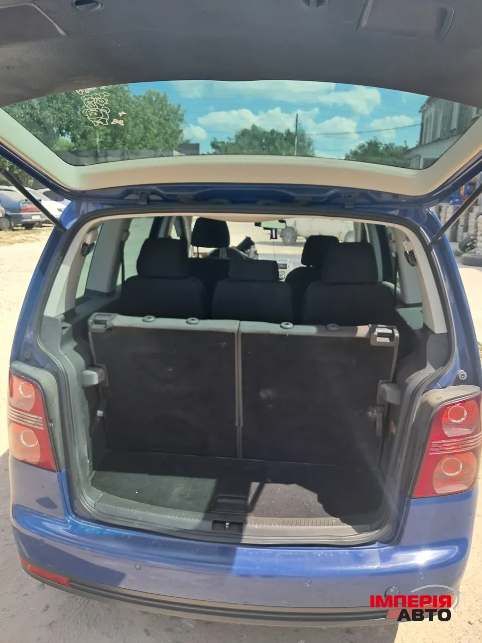 Volkswagen Touran - фото 6