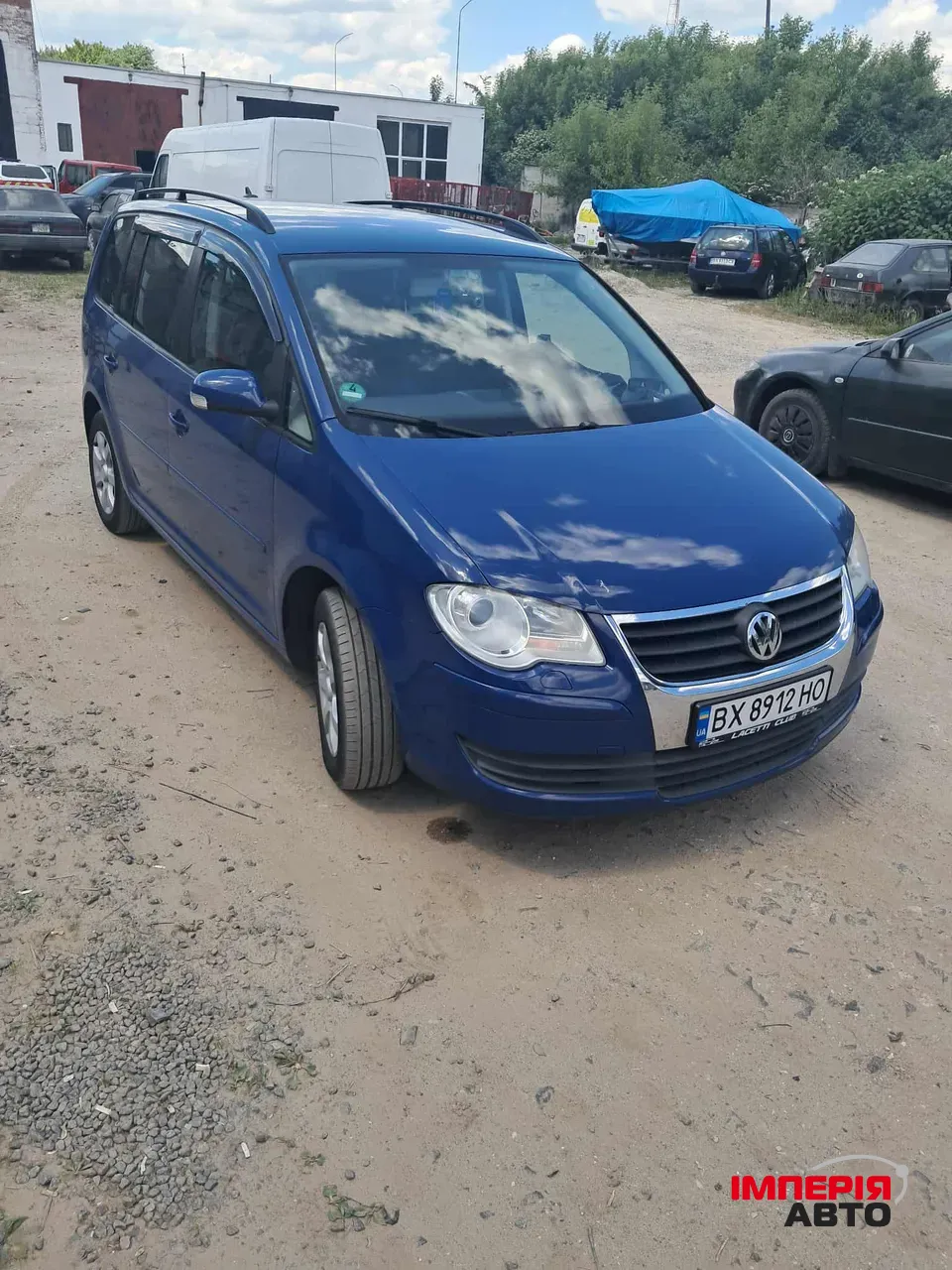 Volkswagen Touran - фото 11