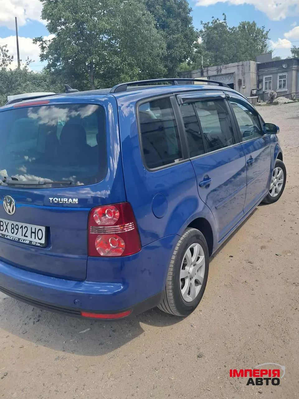 Volkswagen Touran - фото 12
