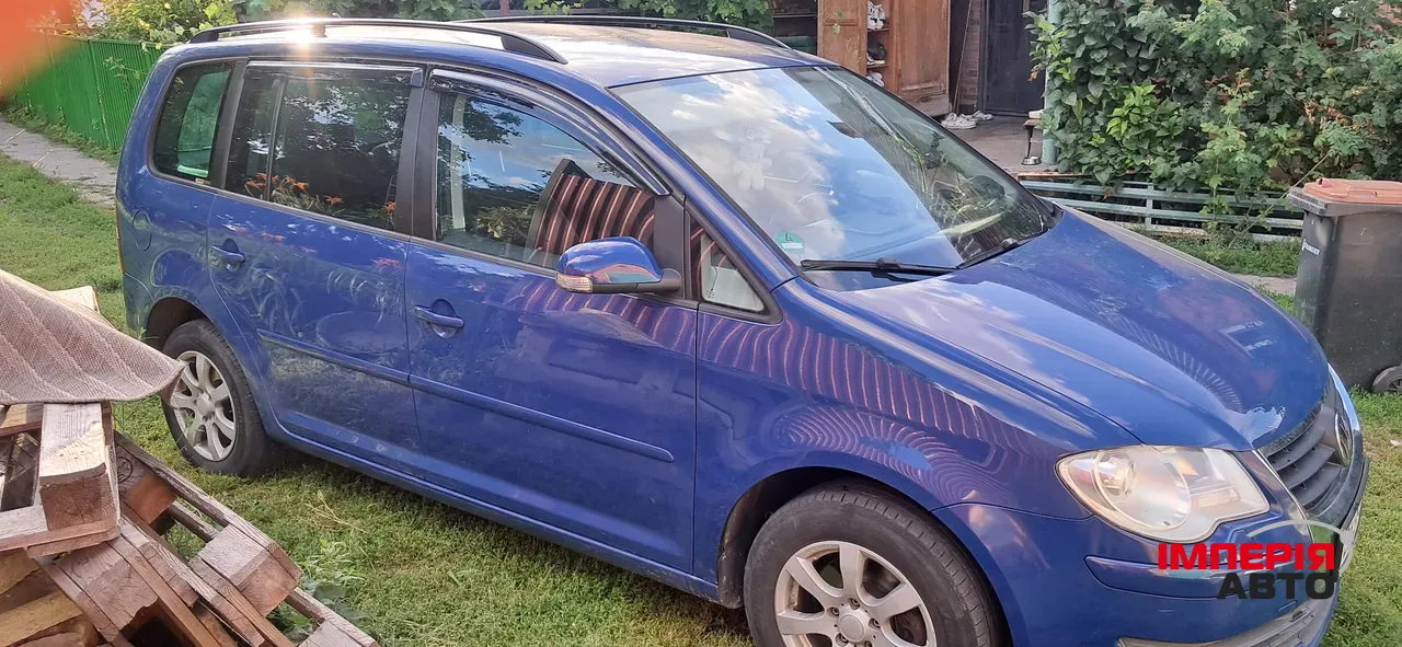 Volkswagen Touran - фото 9