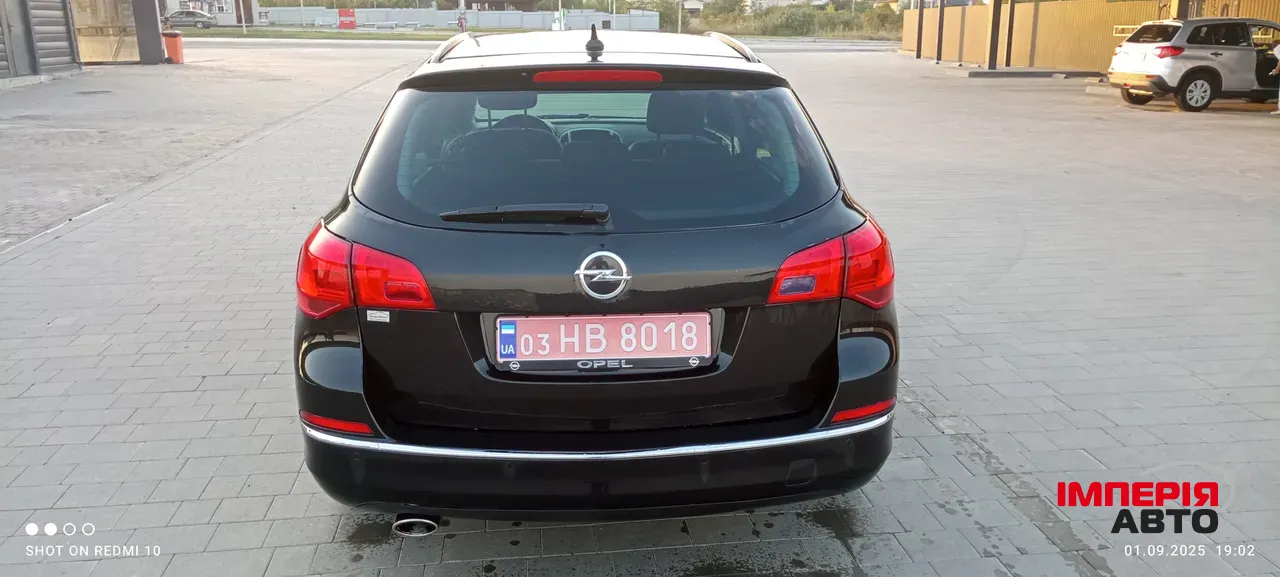 Opel Astra - фото 2