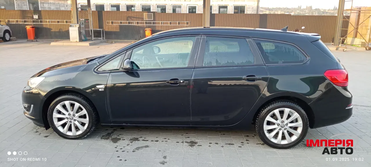 Opel Astra - фото 8