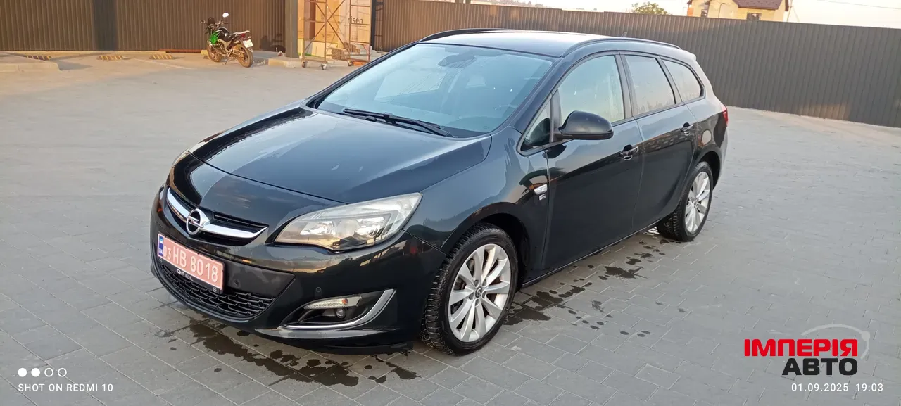 Opel Astra - фото 1