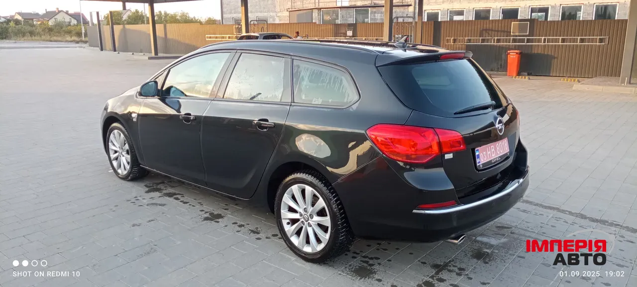 Opel Astra - фото 7