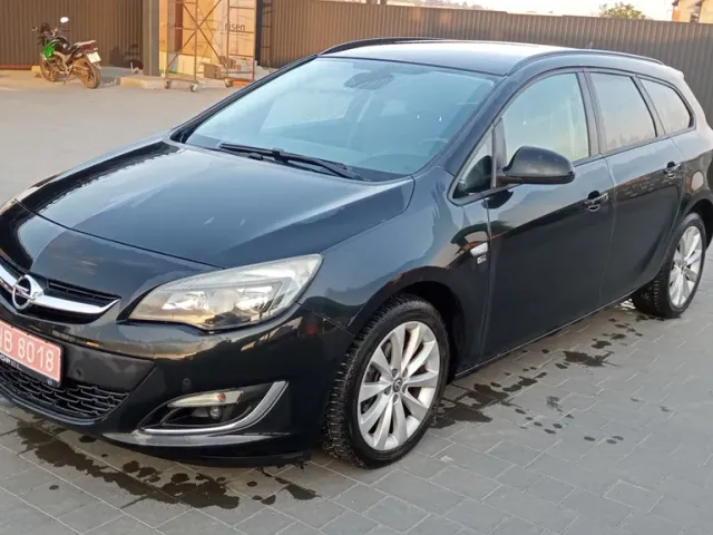 Opel Astra - фото 1