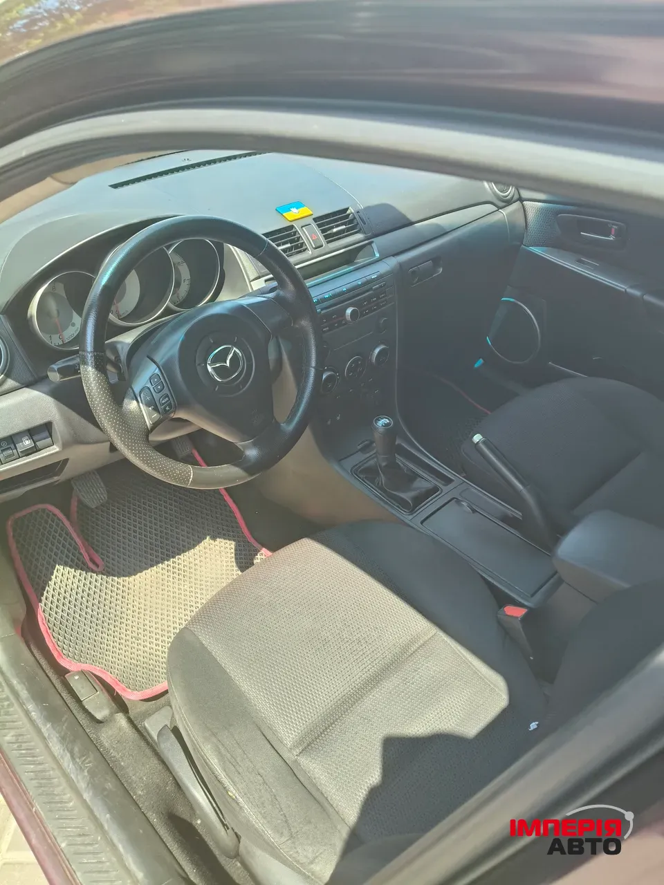 Mazda 3 - фото 2