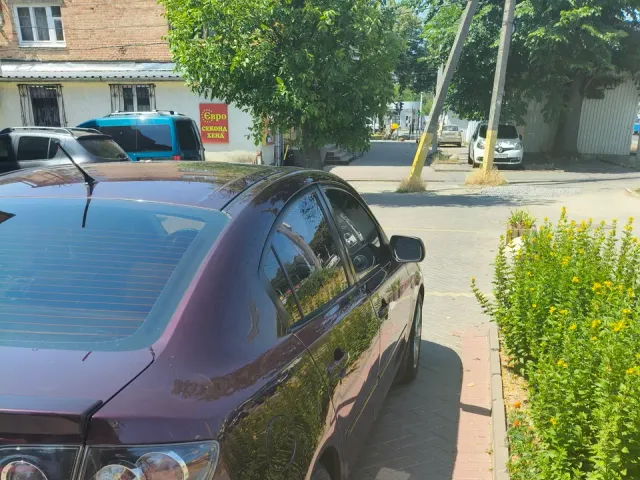 Mazda 3 - фото 5