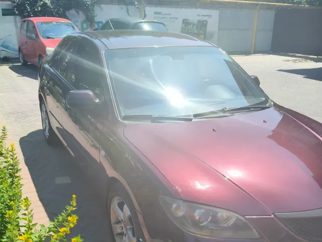 Mazda 3 - фото 1