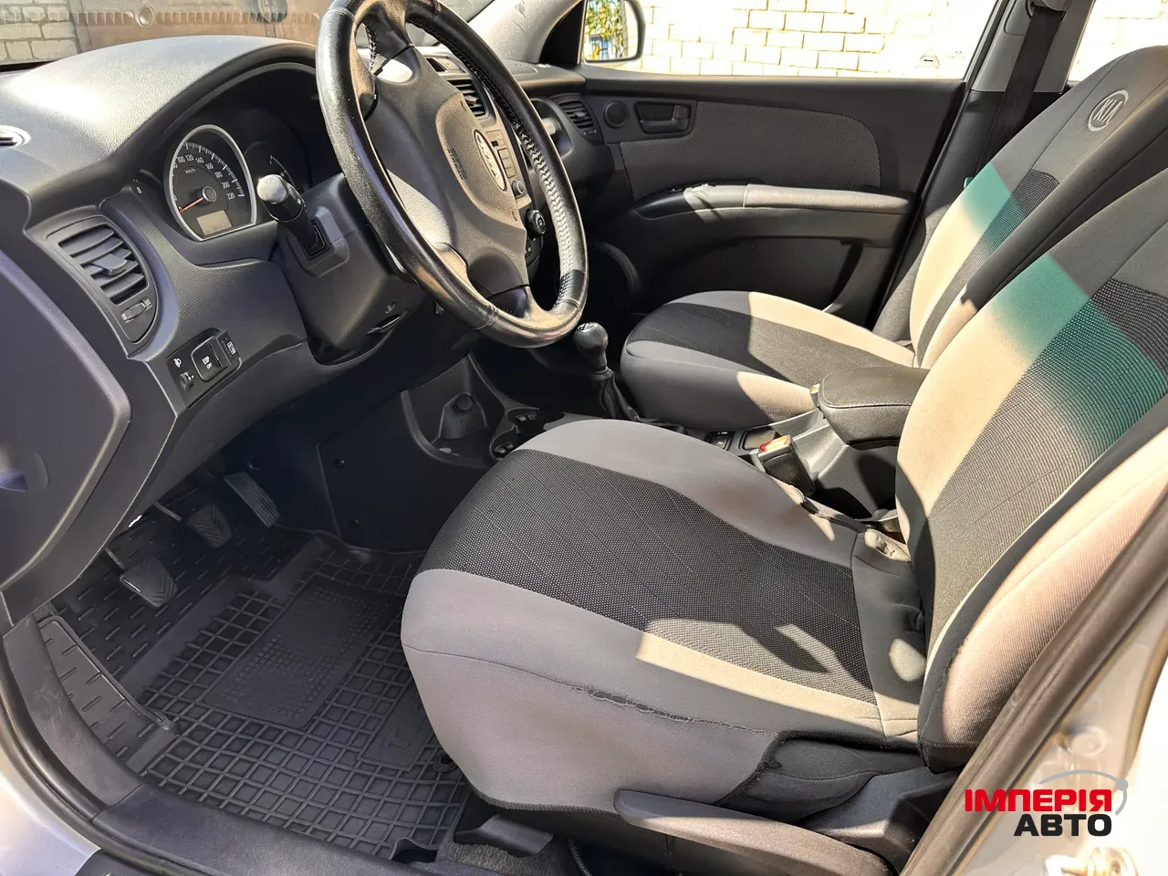Kia Sportage - фото 12