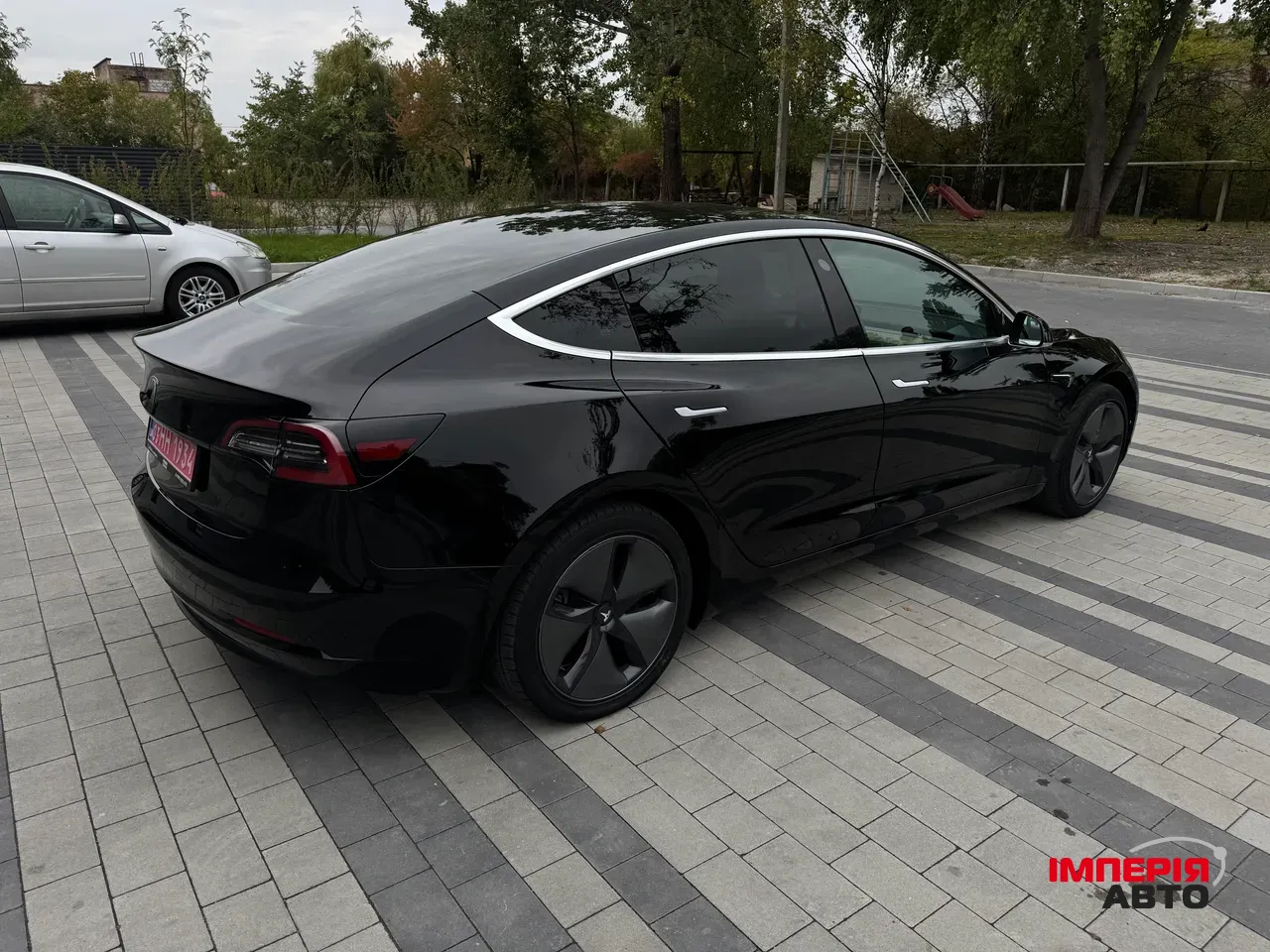 Tesla Model 3 - фото 4