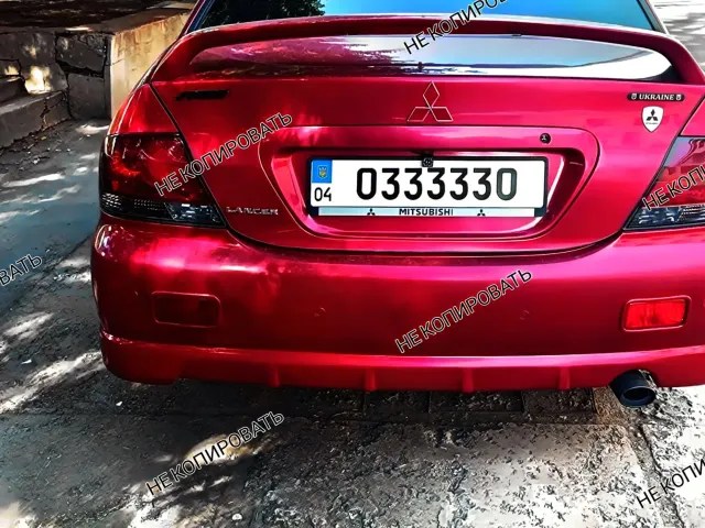 Mitsubishi Lancer - фото 4