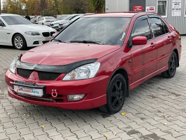 Mitsubishi Lancer - фото 1