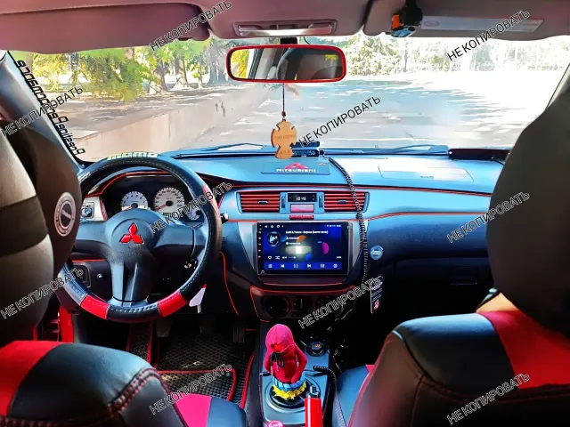 Mitsubishi Lancer - фото 1