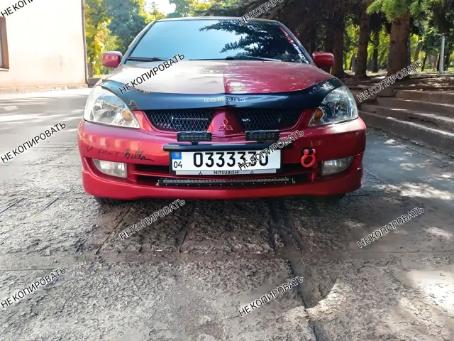 Mitsubishi Lancer - фото 5