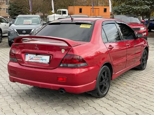 Mitsubishi Lancer - фото 4