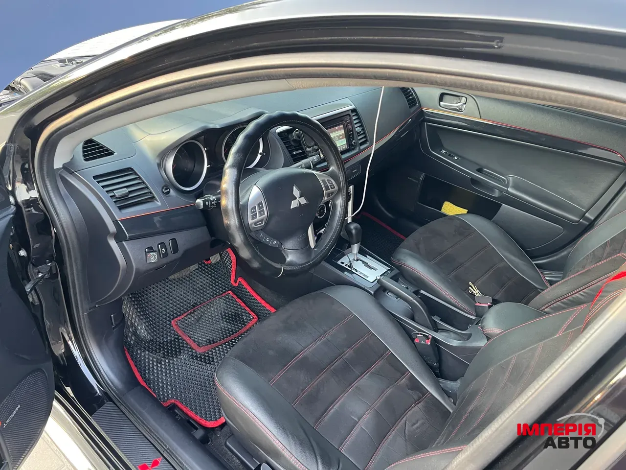 Mitsubishi Lancer - фото 14