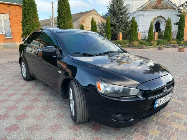 Mitsubishi Lancer - фото 3