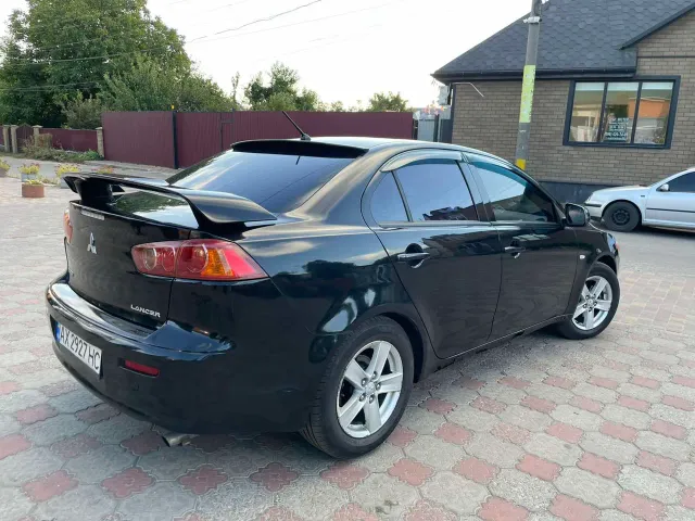Mitsubishi Lancer - фото 1