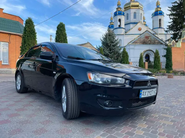 Mitsubishi Lancer - фото 4