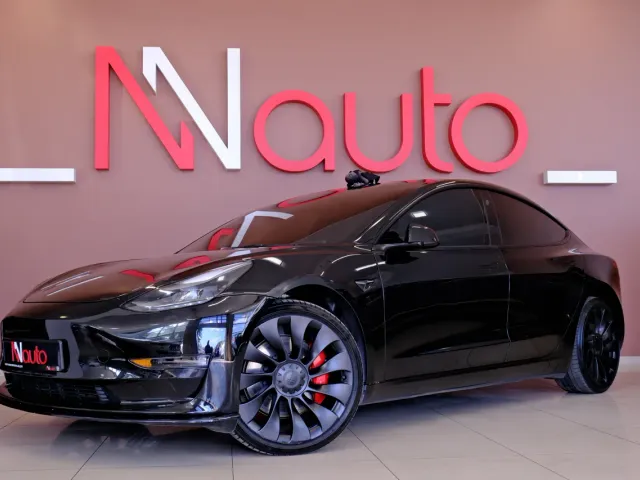 Tesla Model 3 - фото 1