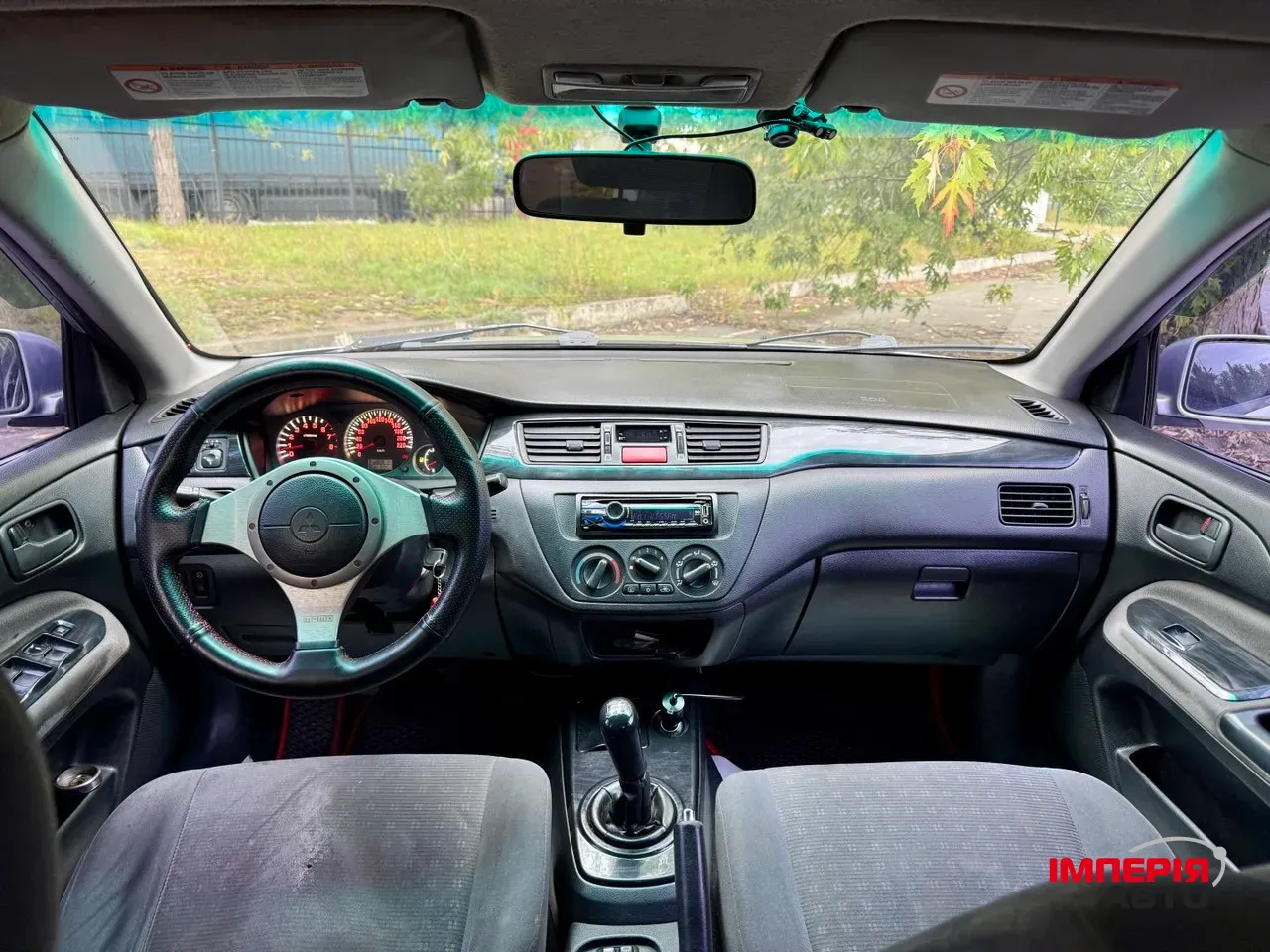 Mitsubishi Lancer - фото 20