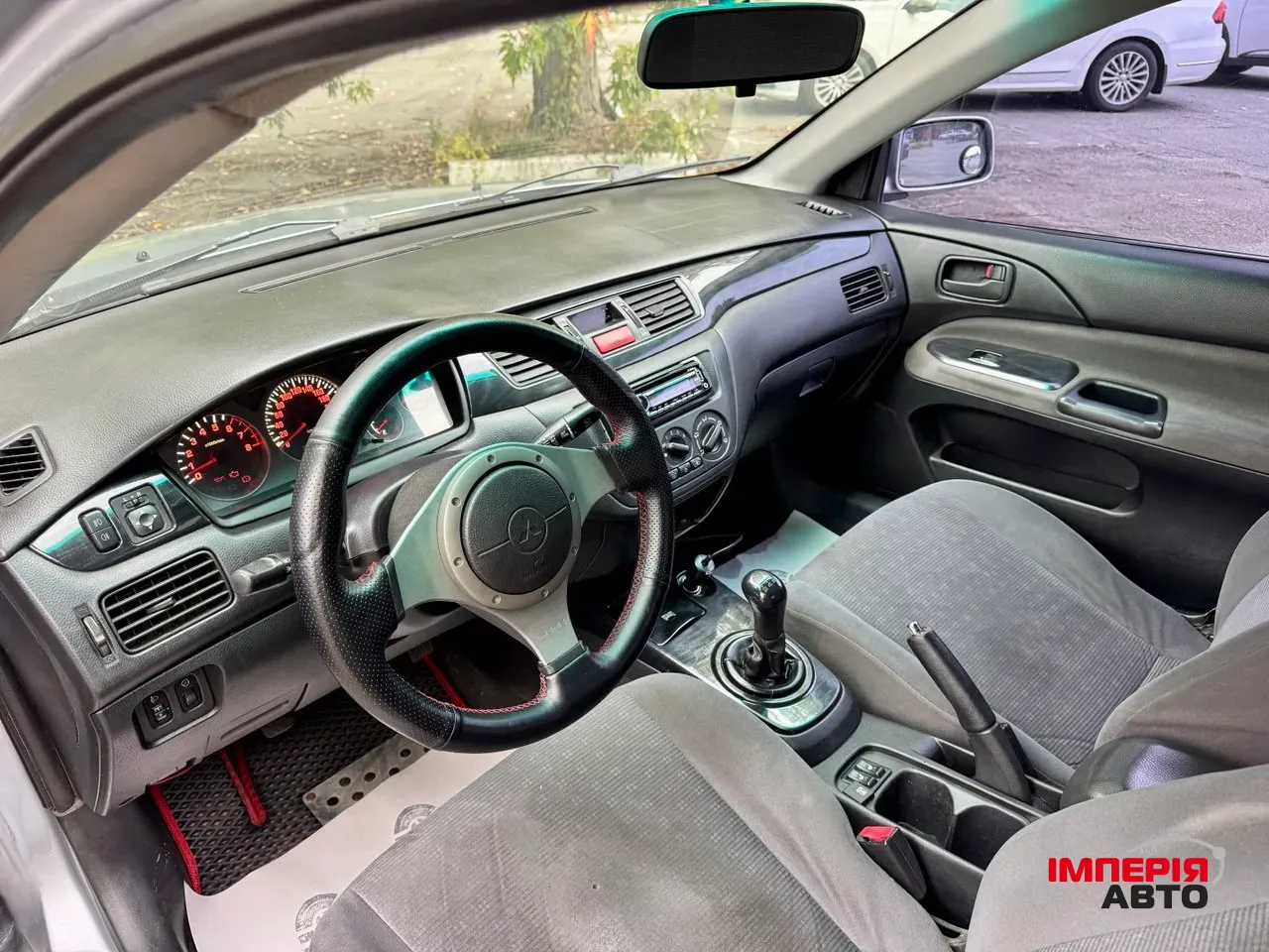 Mitsubishi Lancer - фото 26