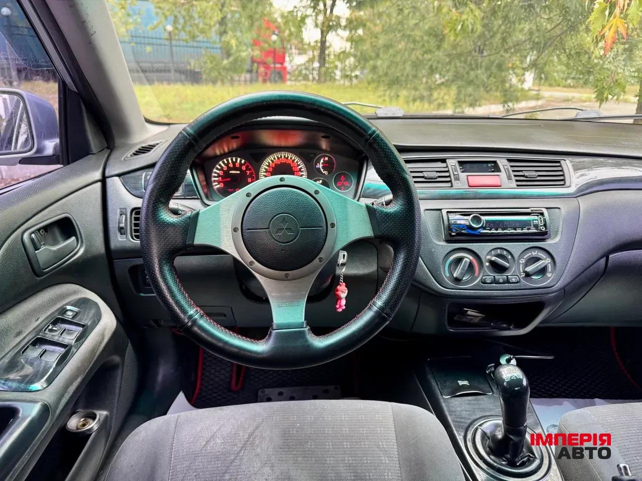 Mitsubishi Lancer - фото 24