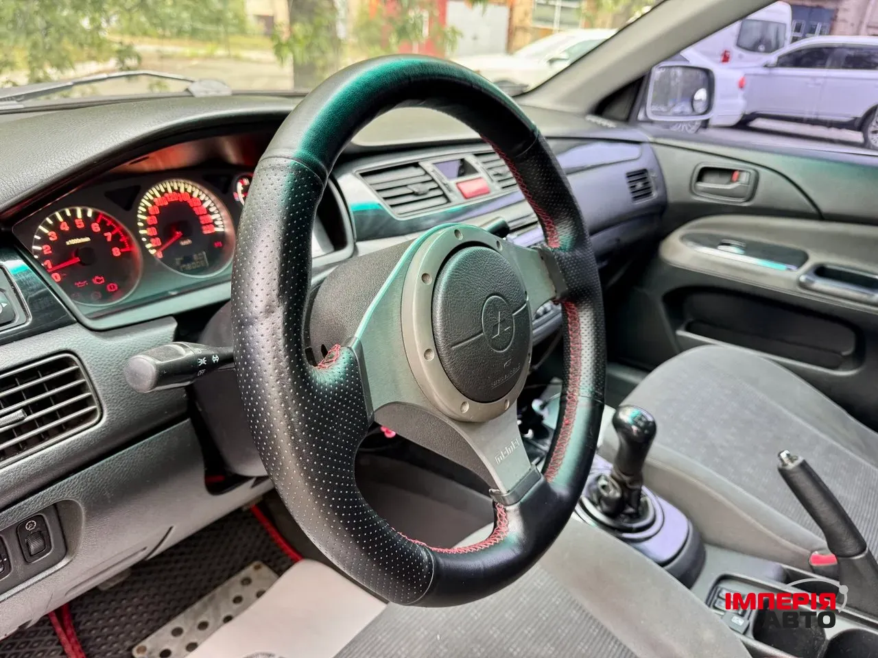 Mitsubishi Lancer - фото 23