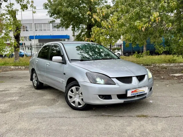 Mitsubishi Lancer - фото 1