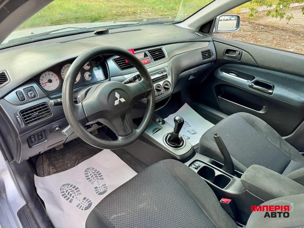 Mitsubishi Lancer - фото 23