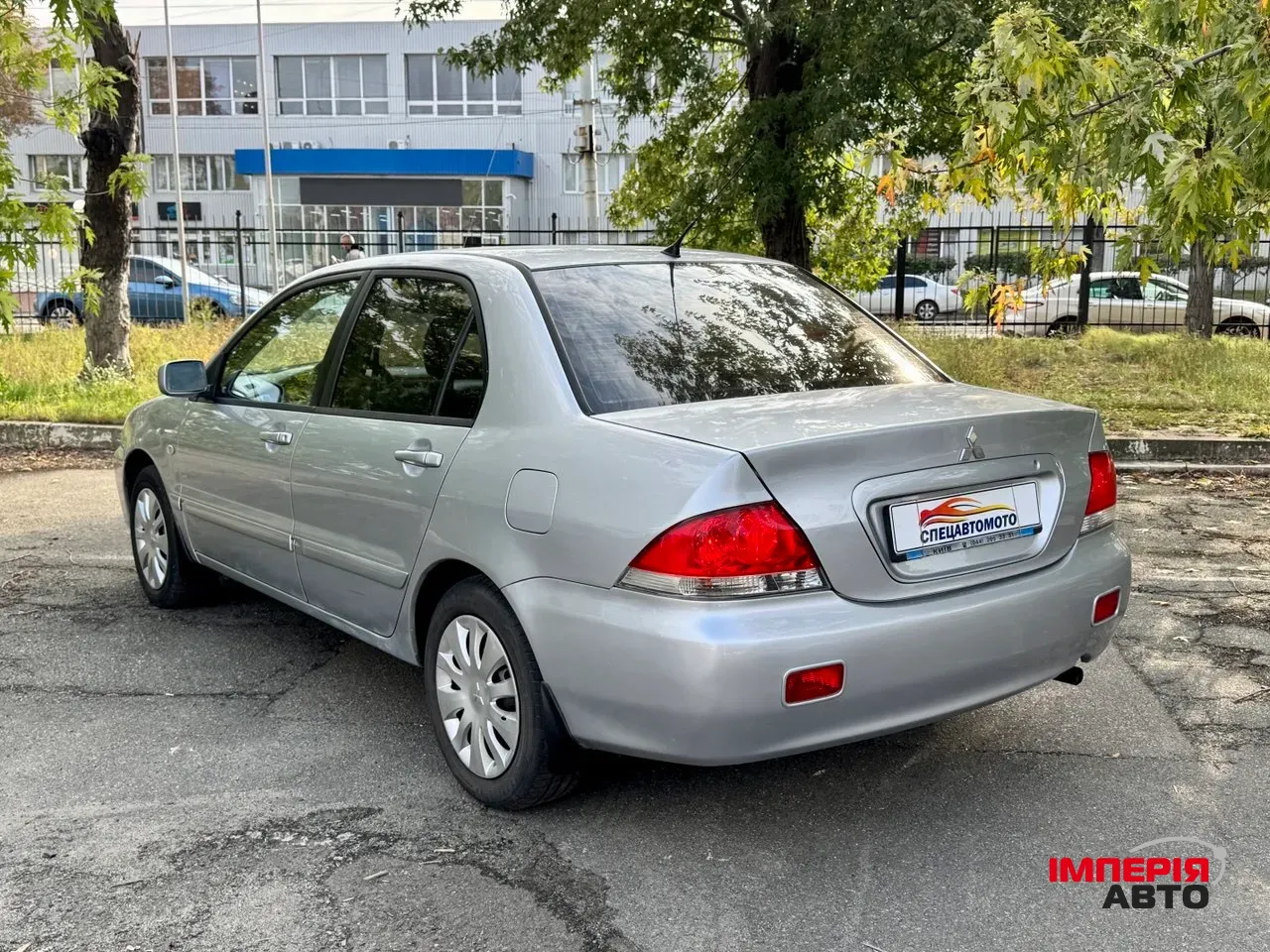 Mitsubishi Lancer - фото 9