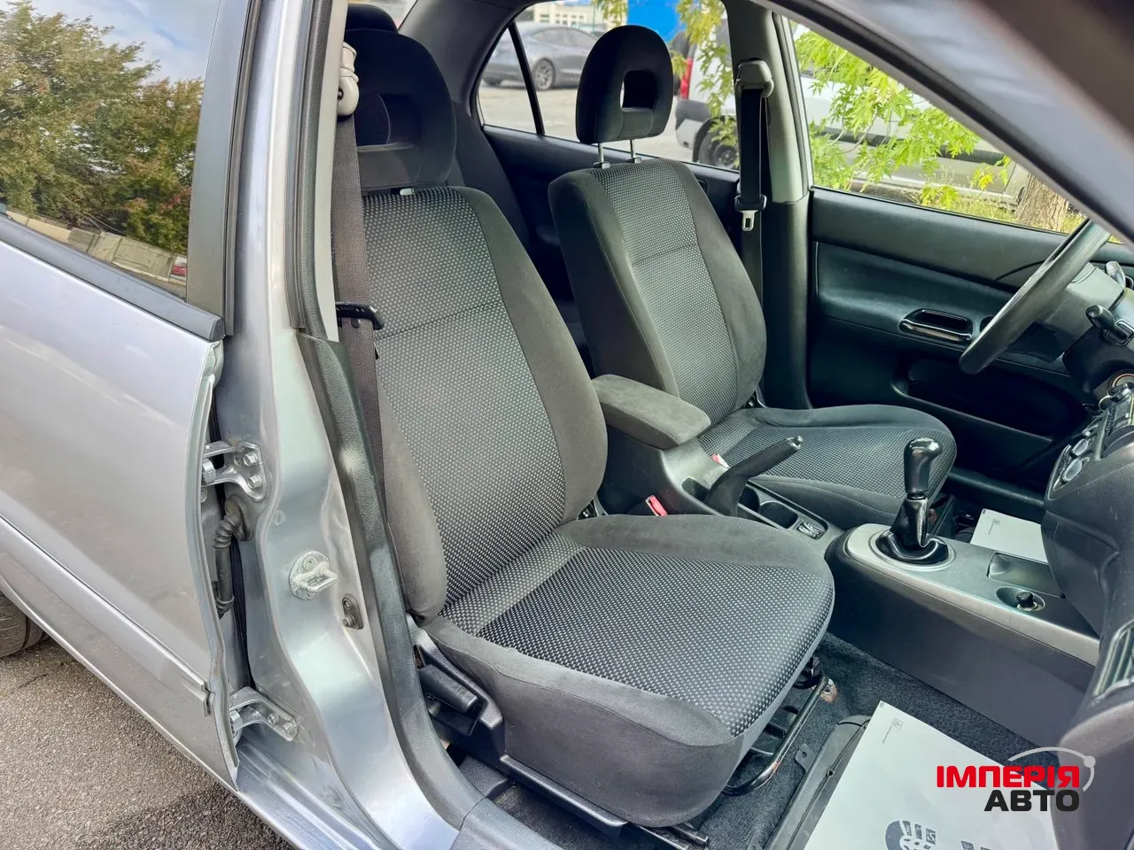 Mitsubishi Lancer - фото 16