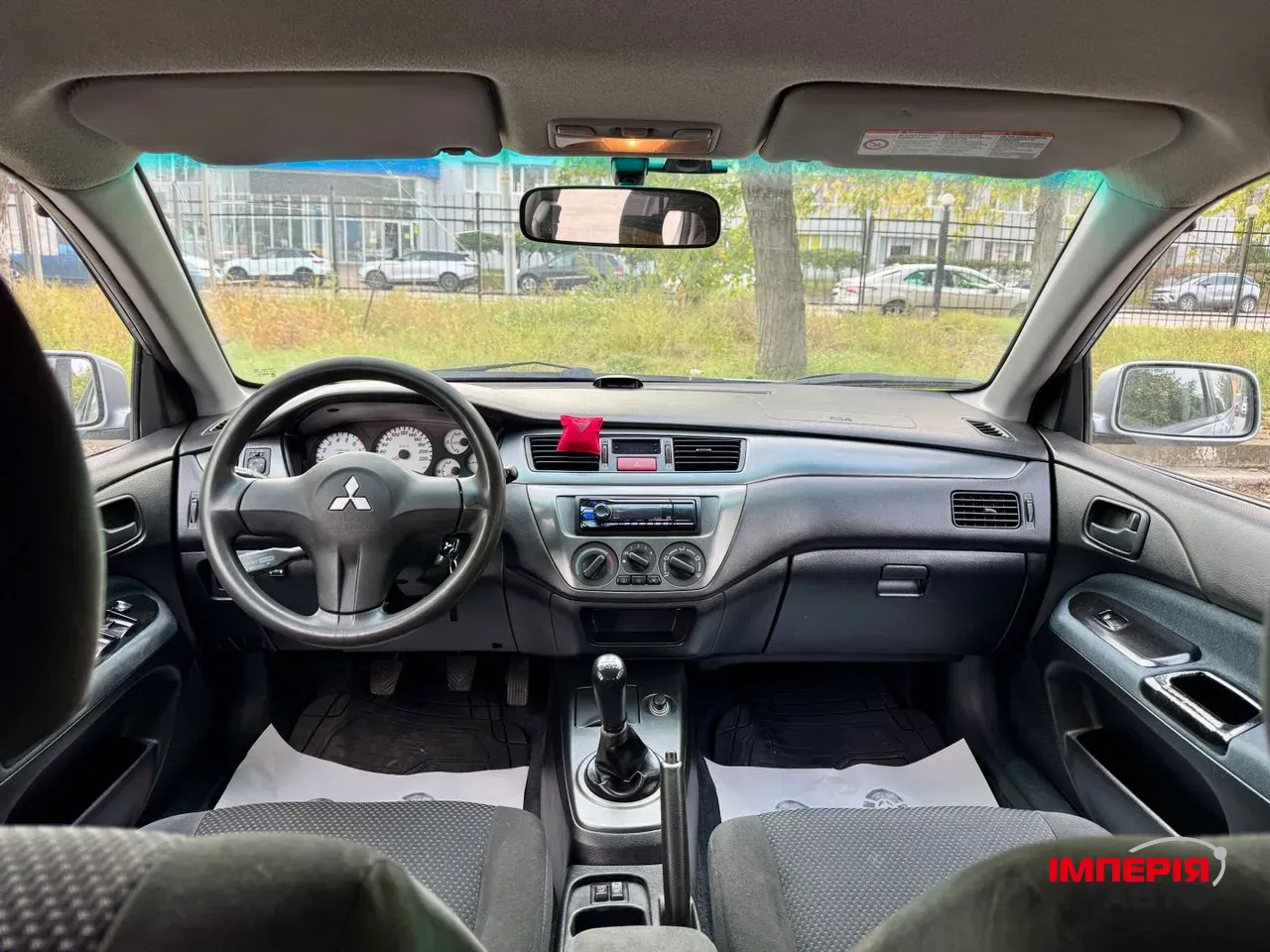 Mitsubishi Lancer - фото 19