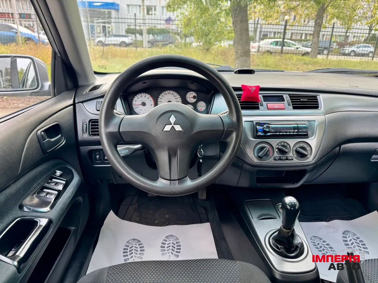 Mitsubishi Lancer - фото 18