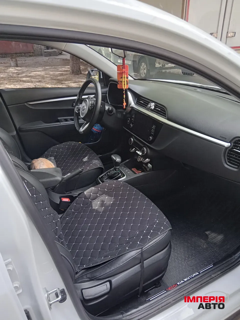 Kia Rio - фото 11