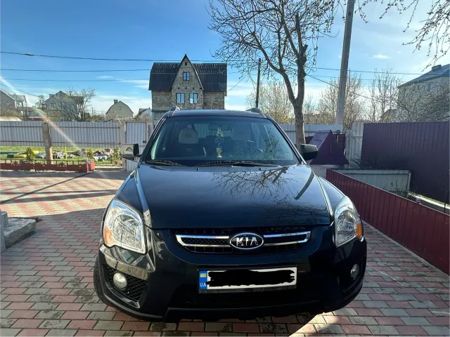 Kia Sportage - фото 1