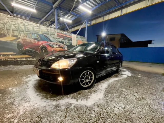 Mitsubishi Lancer - фото 5