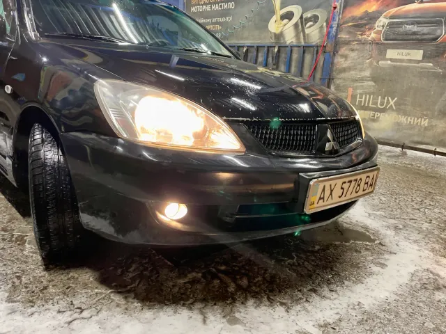 Mitsubishi Lancer - фото 1
