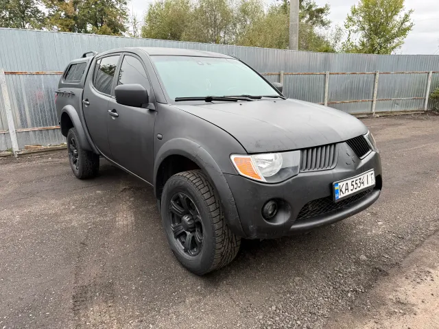 Mitsubishi L200 - фото 1
