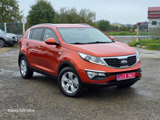 Kia Sportage - фото 1