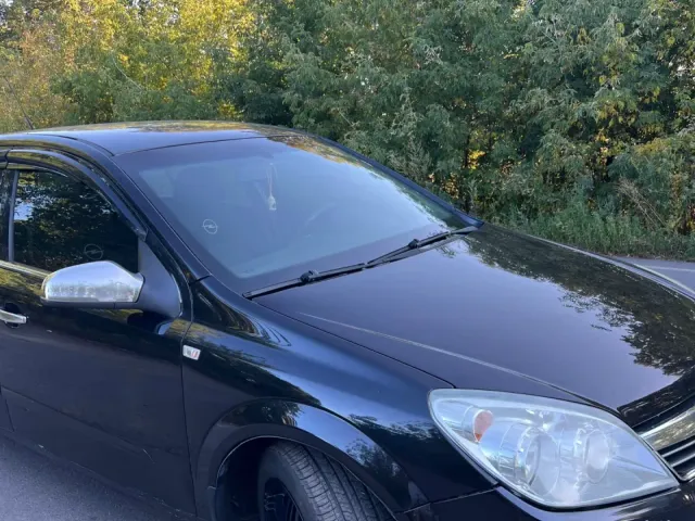 Opel Astra - фото 1