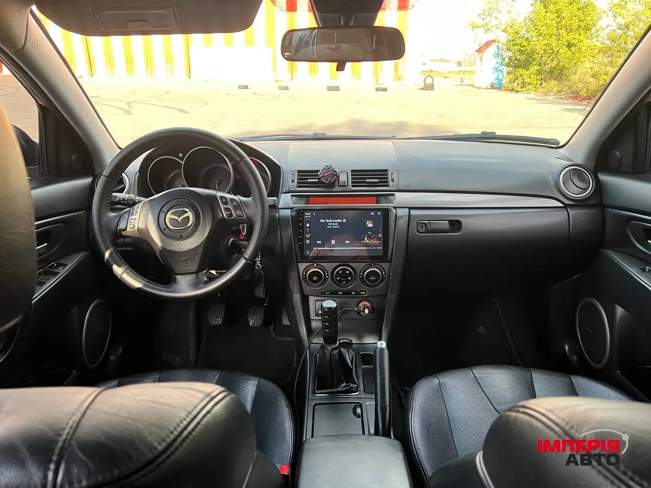 Mazda 3 - фото 12