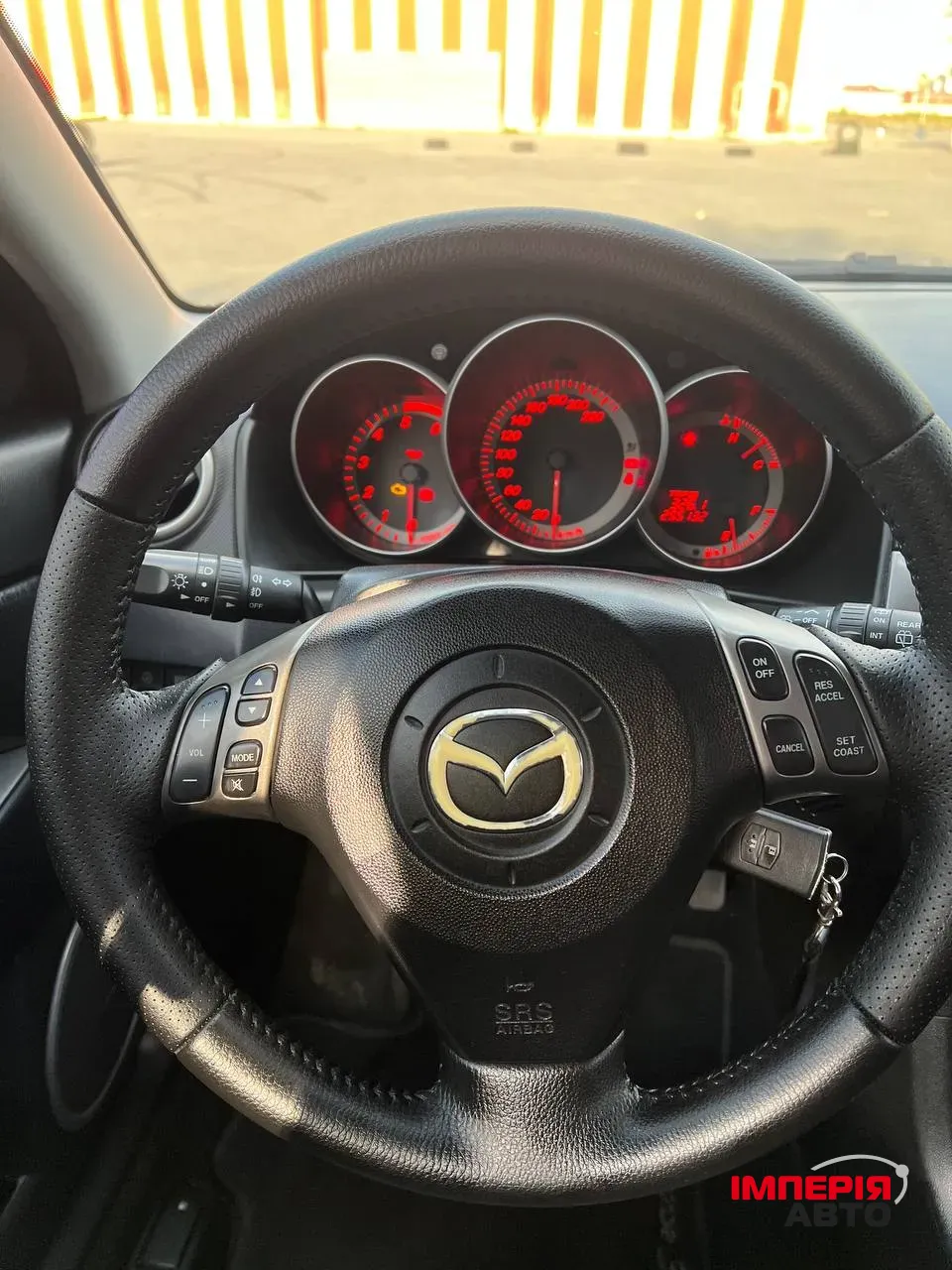 Mazda 3 - фото 14