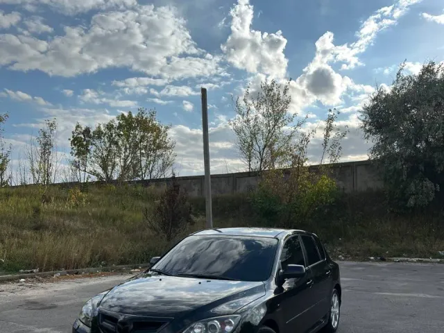 Mazda 3 - фото 1