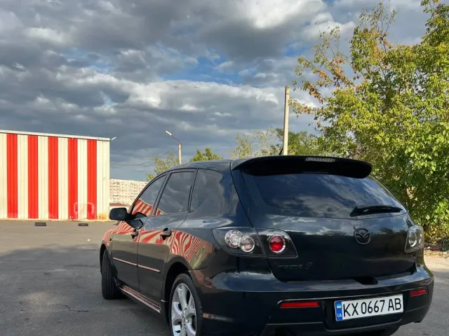 Mazda 3 - фото 4