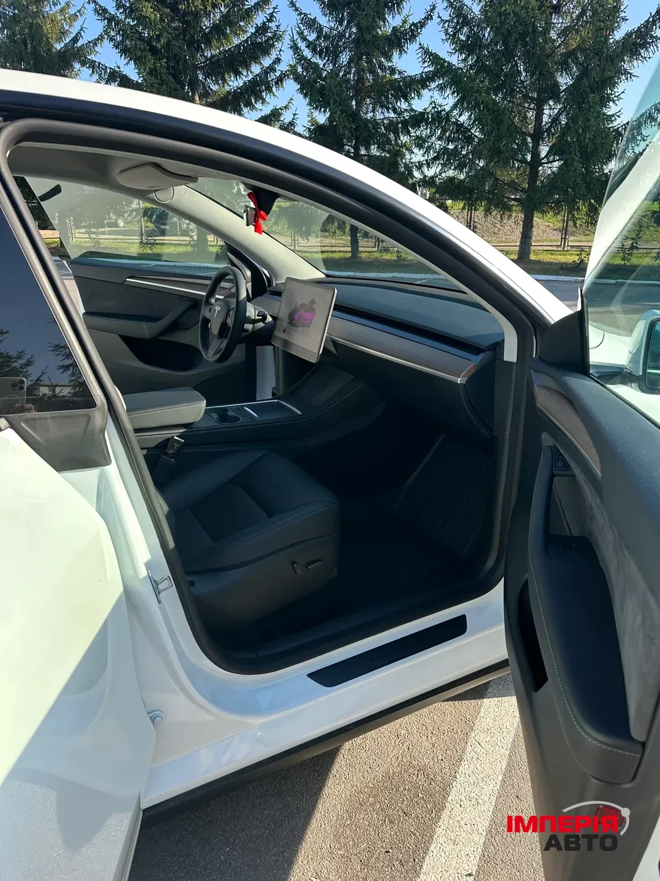 Tesla Model Y - фото 18