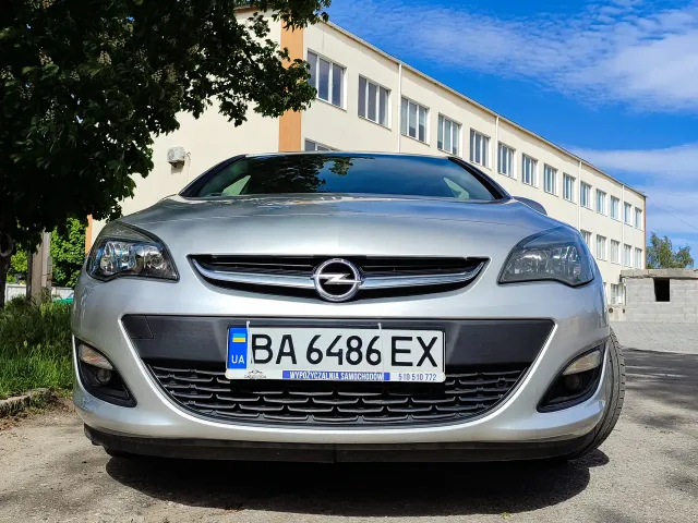 Opel Astra - фото 1