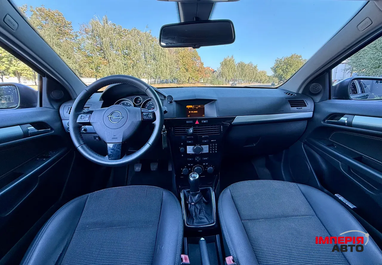 Opel Astra - фото 7