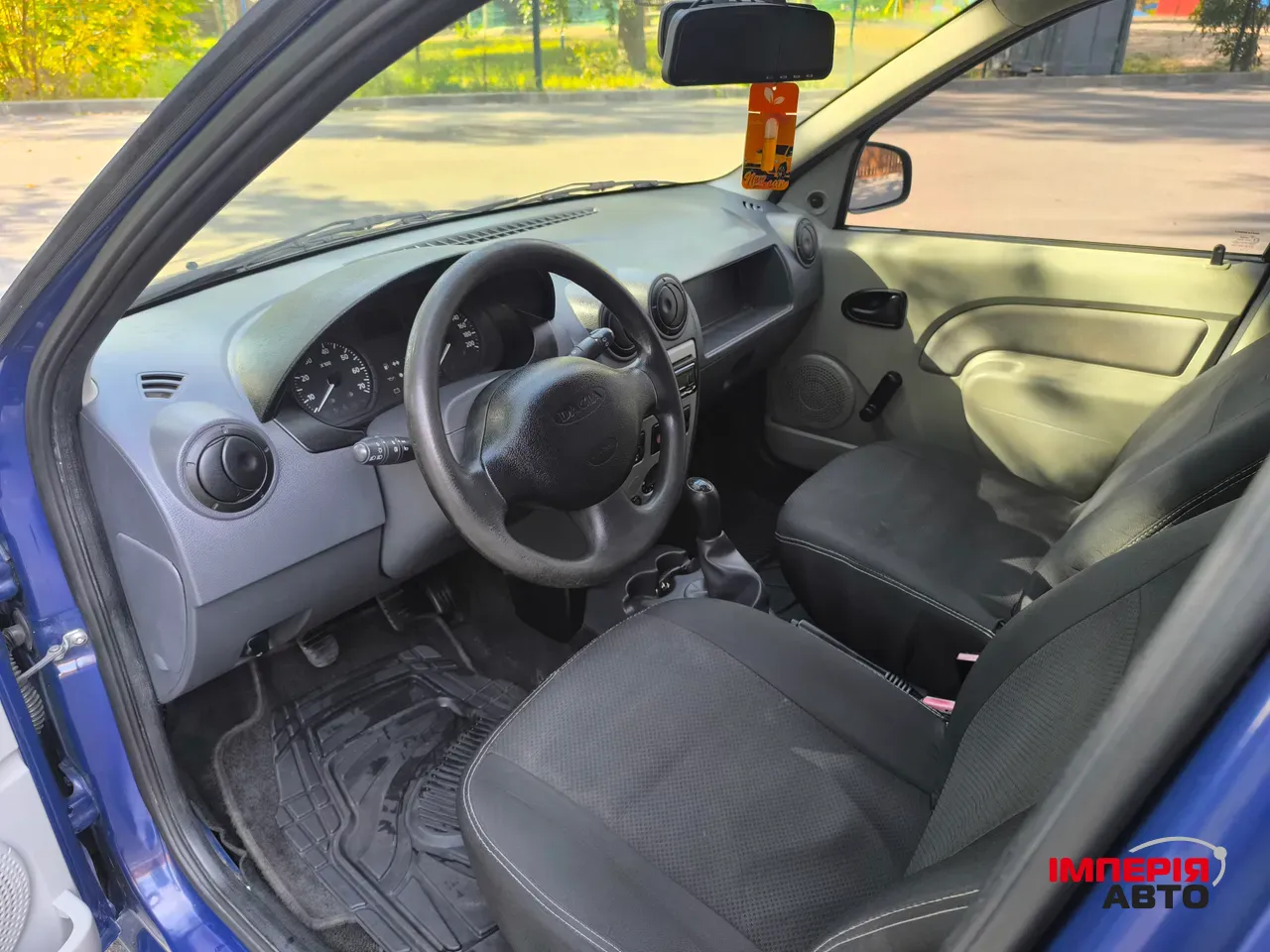 Dacia Logan - фото 8