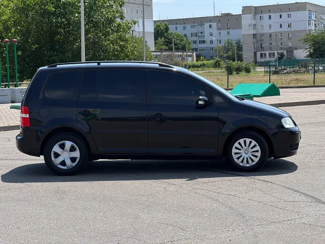 Volkswagen Touran - фото 3